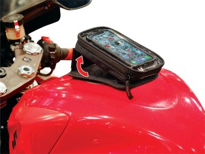 Photo showing expanded magnetic phone holder on red tank
